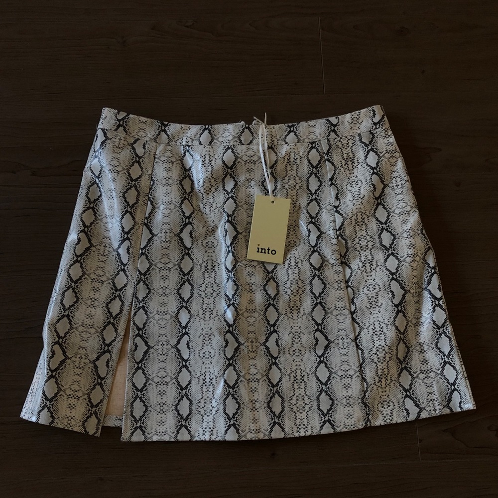 brand new snake skin skirt with cut out in front